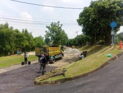 Program TJSL BRI BO Cibinong Ubah Jalan Rusak Jadi Aspal di Tangkil
