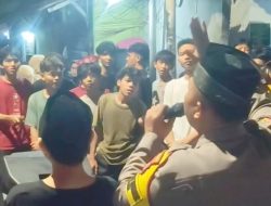 Bhabinkamtibmas Monitoring Pawai Obor RW 07 dan RW 08 Bendungan Hilir